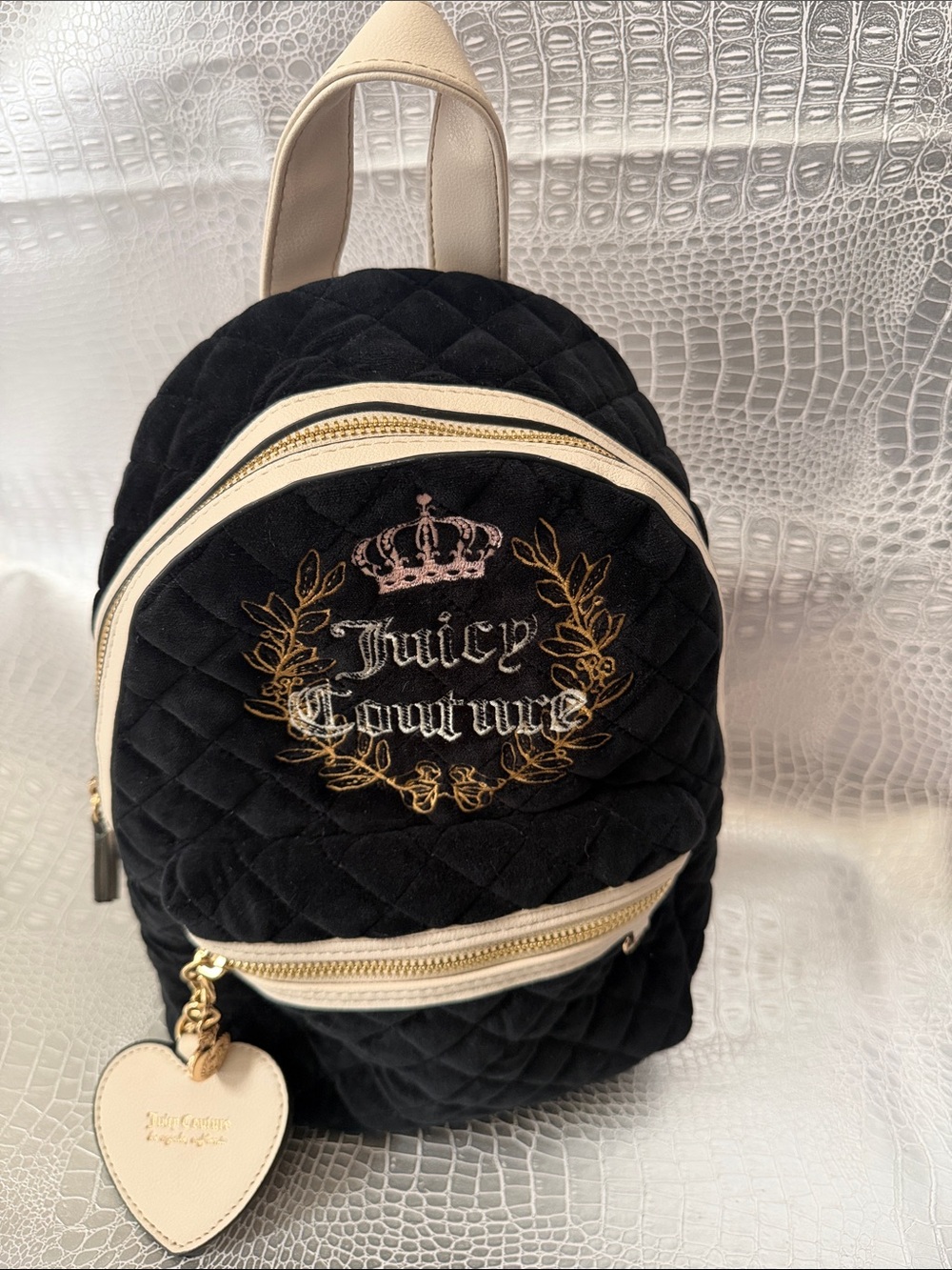 Juicy Couture Black Quilted Mini Backpack with Cream Trim and Gold Accents